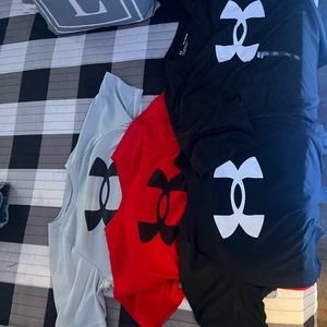 Under armor shirts, one still has the tag on it.